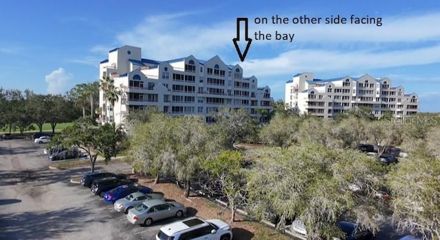 2333 Feather Sound Dr Unit A607, Clearwater, FL 33762 - view of property featuring uncovered parking