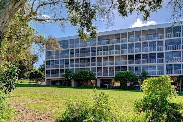 9510 Harbor Greens Way Unit 406, Seminole, FL 33776 - view of apartment building / complex