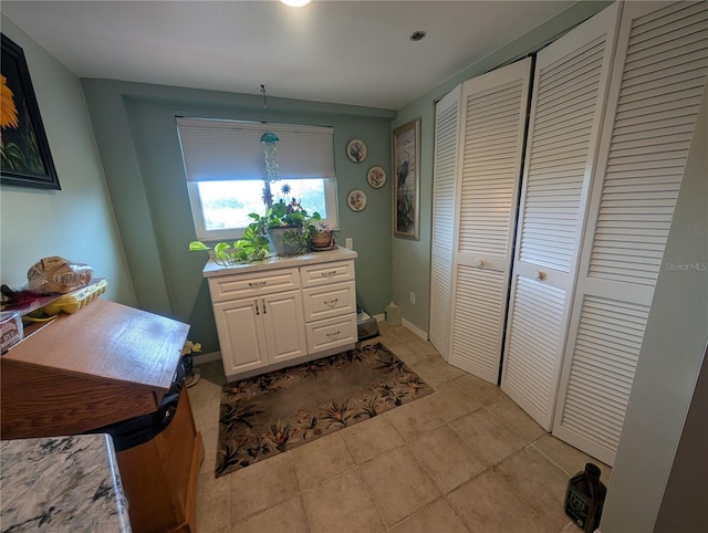 9510 Harbor Greens Way Unit 406, Seminole, FL 33776 - dining space with light tile patterned flooring