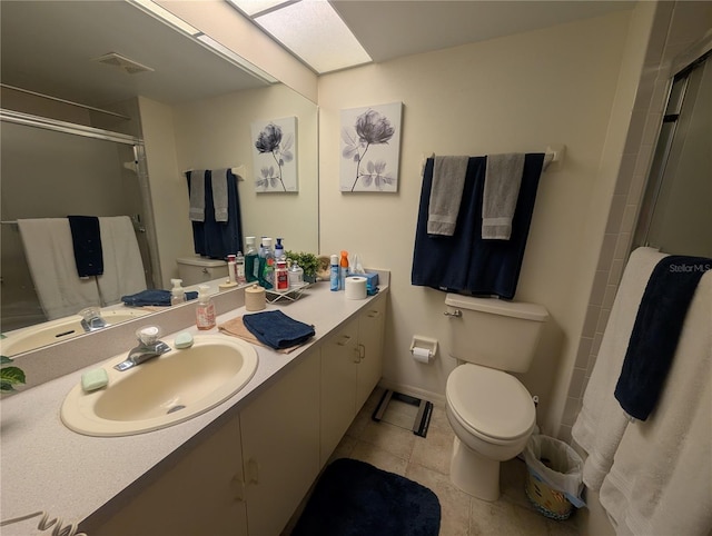 9510 Harbor Greens Way Unit 406, Seminole, FL 33776 - full bathroom featuring tile patterned flooring, vanity, and an enclosed shower