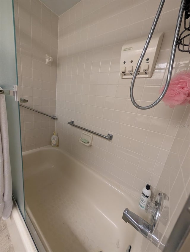 9510 Harbor Greens Way Unit 406, Seminole, FL 33776 - full bathroom featuring shower / washtub combination