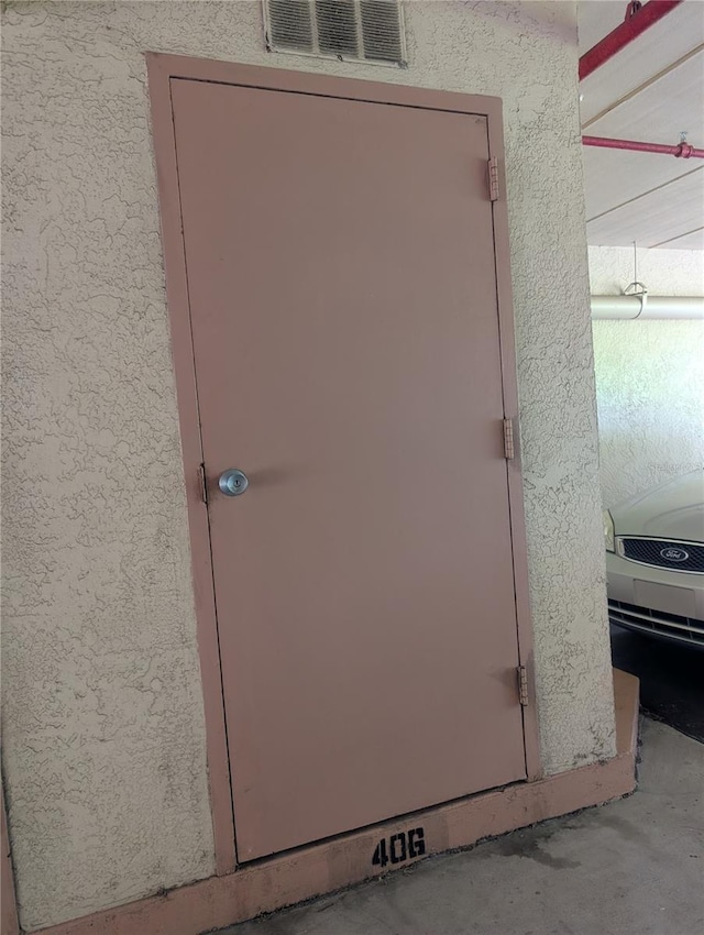 9510 Harbor Greens Way Unit 406, Seminole, FL 33776 - entrance to property featuring stucco siding