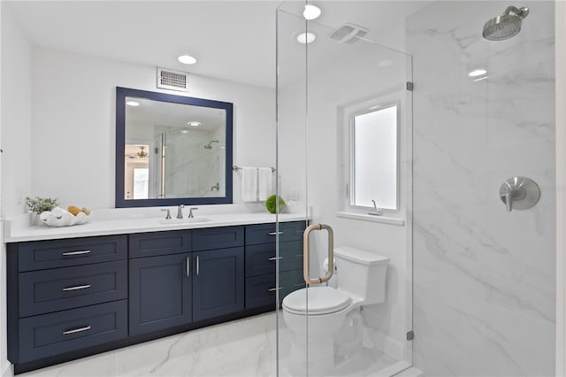 221 42nd Ave, St Pete Beach, FL 33706 - bathroom featuring a marble finish shower, vanity, and marble finish floors