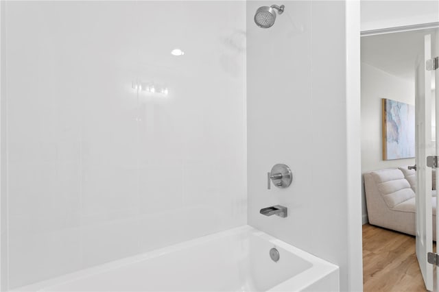 221 42nd Ave, St Pete Beach, FL 33706 - full bath with shower / washtub combination and wood finished floors