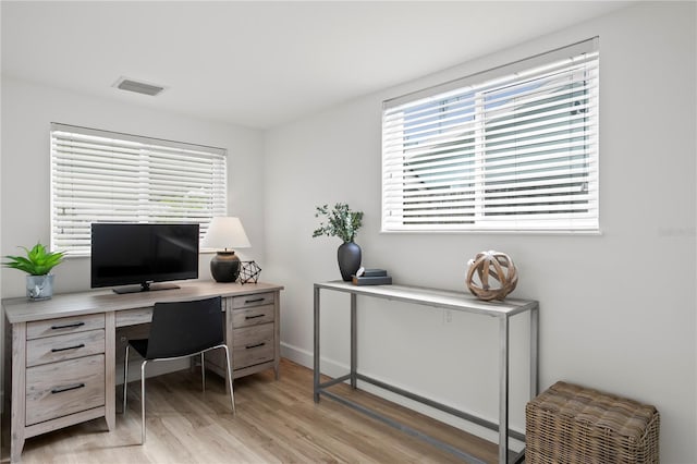 221 42nd Ave, St Pete Beach, FL 33706 - home office featuring light wood-style flooring