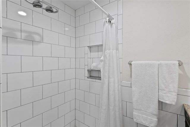 221 42nd Ave, St Pete Beach, FL 33706 - full bathroom featuring tiled shower and vanity