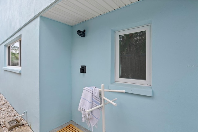 221 42nd Ave, St Pete Beach, FL 33706 - exterior space featuring stucco siding