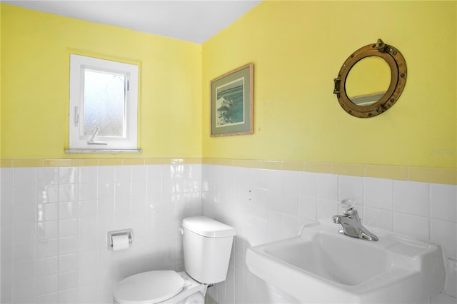 221 42nd Ave, St Pete Beach, FL 33706 - half bath featuring tile walls and wainscoting