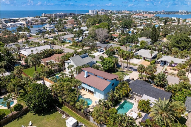 221 42nd Ave, St Pete Beach, FL 33706 - aerial perspective of suburban area featuring a pool area and a large body of water