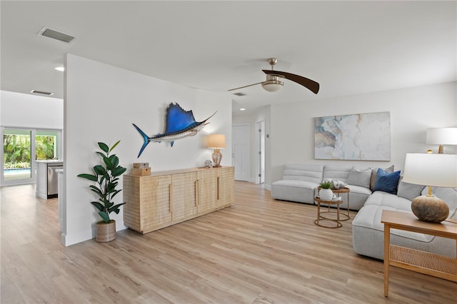 221 42nd Ave, St Pete Beach, FL 33706 - living area featuring light wood finished floors, a ceiling fan, and recessed lighting