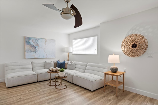 221 42nd Ave, St Pete Beach, FL 33706 - living room featuring ceiling fan and wood finished floors