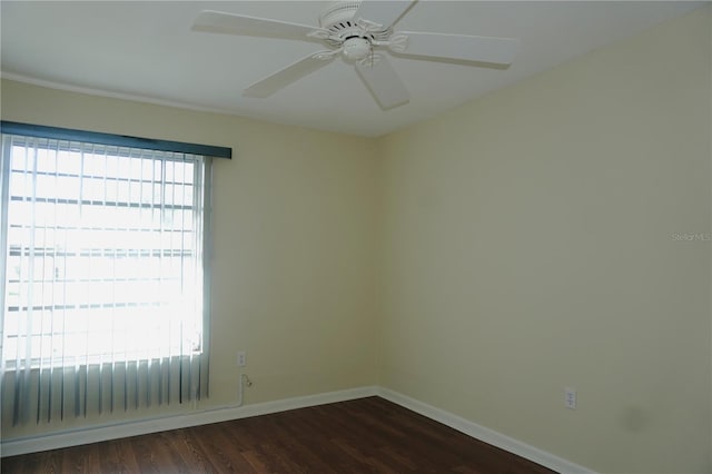 4329 Tahitian Gardens Cir Unit B, Holiday, FL 34691 - empty room with dark wood finished floors and ceiling fan