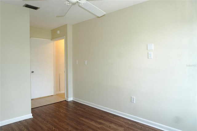 4329 Tahitian Gardens Cir Unit B, Holiday, FL 34691 - empty room with ceiling fan and dark wood-style flooring