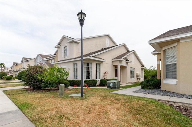 6260 Olivedale Dr, Riverview, FL 33578 - view of front of home featuring a front lawn and stucco siding