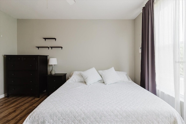 6260 Olivedale Dr, Riverview, FL 33578 - bedroom featuring dark wood-style flooring and baseboards