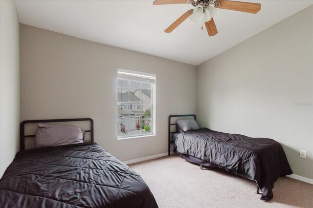 6260 Olivedale Dr, Riverview, FL 33578 - carpeted bedroom with baseboards and a ceiling fan