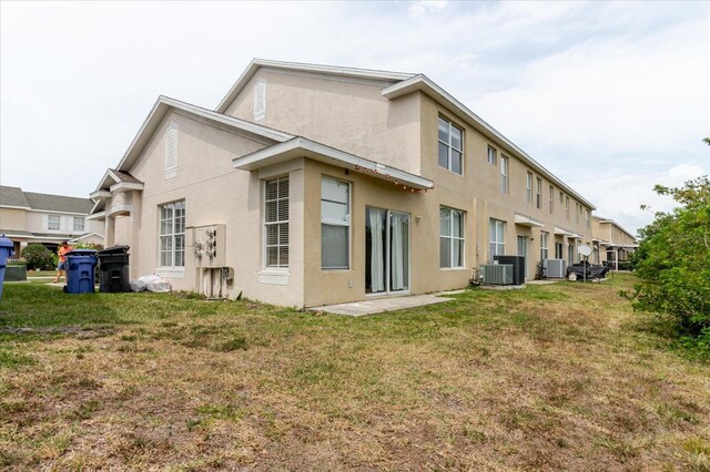 6260 Olivedale Dr, Riverview, FL 33578 - back of house with a yard and stucco siding