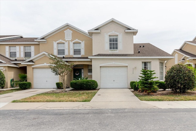 6260 Olivedale Dr, Riverview, FL 33578 - view of front of house with stucco siding, driveway, and an attached garage