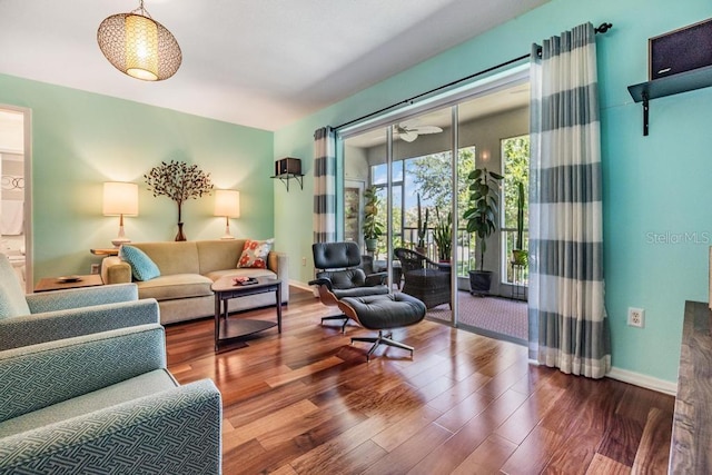 1140 S Pointe Alexis Dr, Tarpon Springs, FL 34689 - living room featuring wood finished floors and ceiling fan