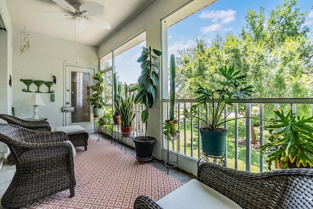 1140 S Pointe Alexis Dr, Tarpon Springs, FL 34689 - sunroom / solarium featuring a ceiling fan and a textured wall
