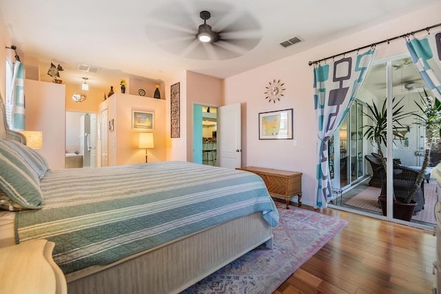 1140 S Pointe Alexis Dr, Tarpon Springs, FL 34689 - bedroom featuring wood finished floors and ceiling fan
