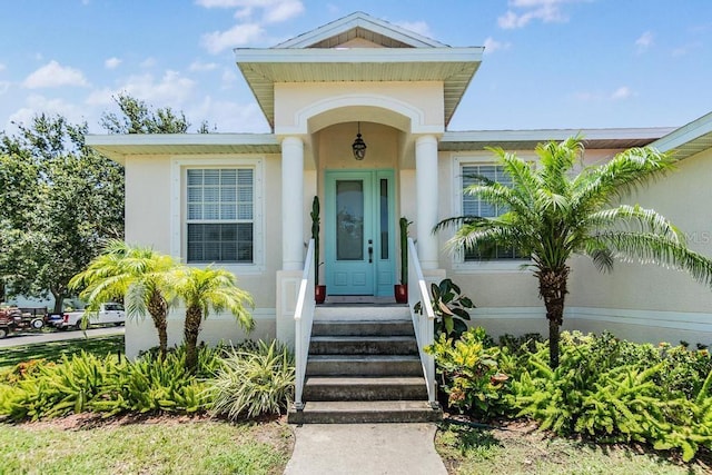 1140 S Pointe Alexis Dr, Tarpon Springs, FL 34689 - property entrance featuring stucco siding