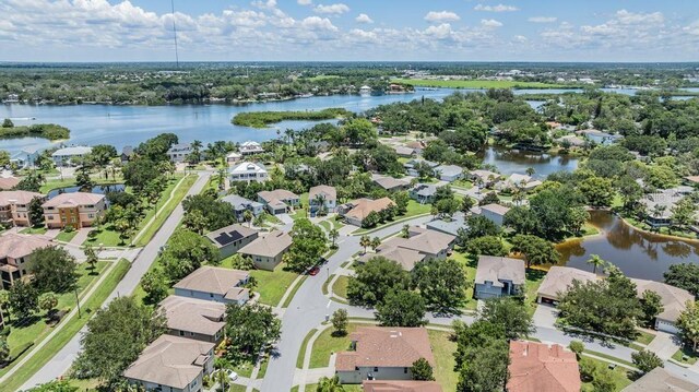 1140 S Pointe Alexis Dr, Tarpon Springs, FL 34689 - aerial perspective of suburban area featuring a nearby body of water