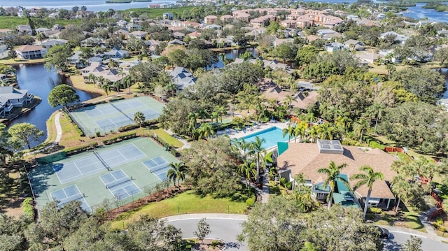 1140 S Pointe Alexis Dr, Tarpon Springs, FL 34689 - aerial perspective of suburban area with a nearby body of water