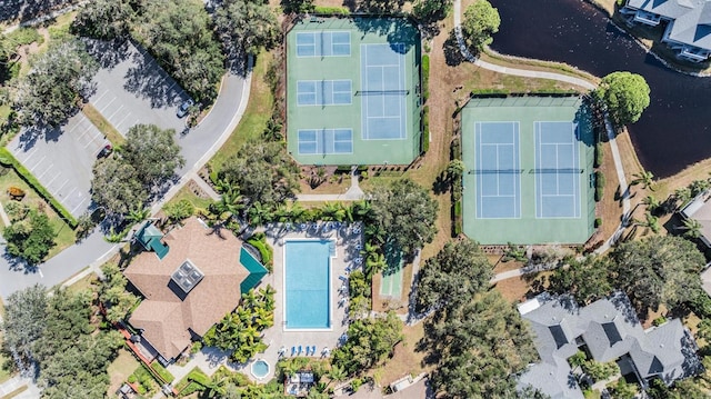 1140 S Pointe Alexis Dr, Tarpon Springs, FL 34689 - drone / aerial view of a pool and a large body of water