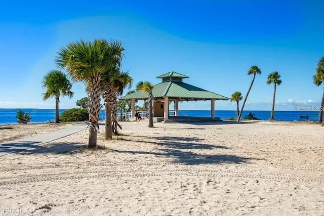 1140 S Pointe Alexis Dr, Tarpon Springs, FL 34689 - view of community featuring a gazebo and a water view