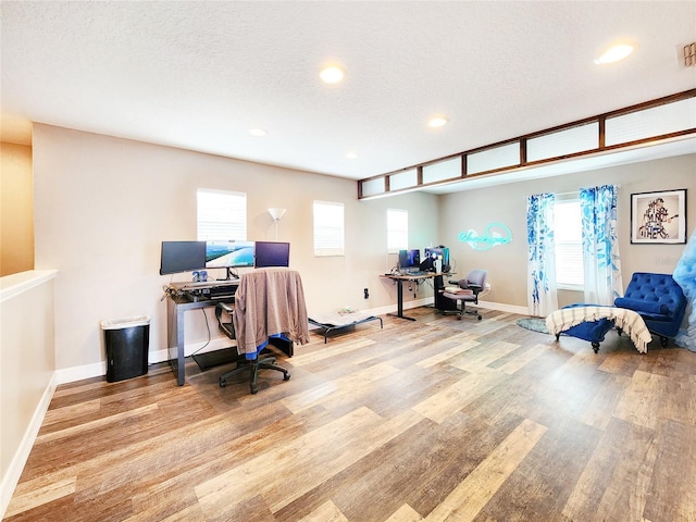3112 Kearns Rd, Mulberry, FL 33860 - office area featuring wood finished floors, healthy amount of natural light, recessed lighting, and a textured ceiling