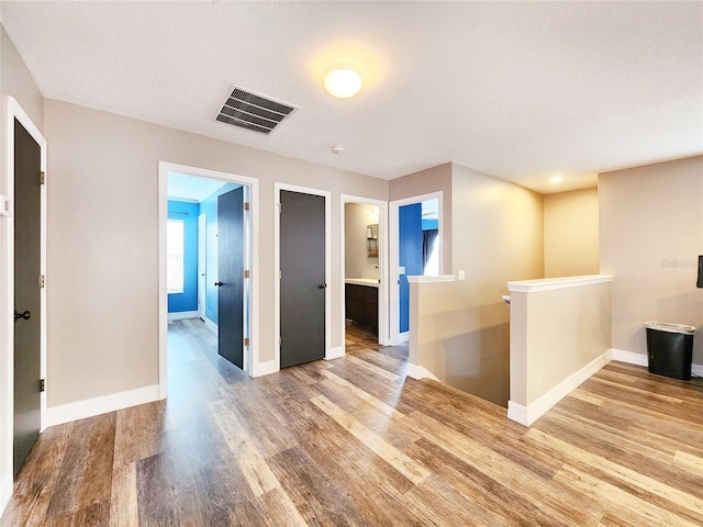 3112 Kearns Rd, Mulberry, FL 33860 - spare room featuring wood finished floors and baseboards