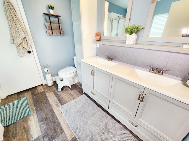 3112 Kearns Rd, Mulberry, FL 33860 - full bathroom with wood finished floors and double vanity