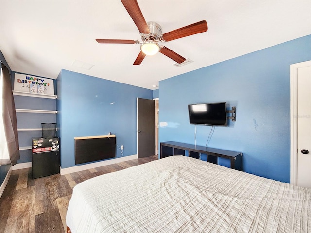 3112 Kearns Rd, Mulberry, FL 33860 - bedroom featuring wood finished floors and a ceiling fan