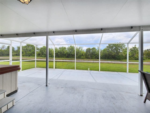 3112 Kearns Rd, Mulberry, FL 33860 - unfurnished sunroom with view of wooded area