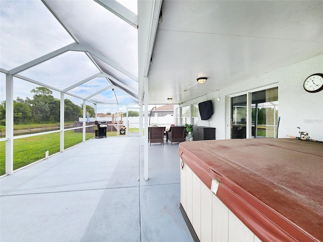 3112 Kearns Rd, Mulberry, FL 33860 - view of patio / terrace with a hot tub and glass enclosure