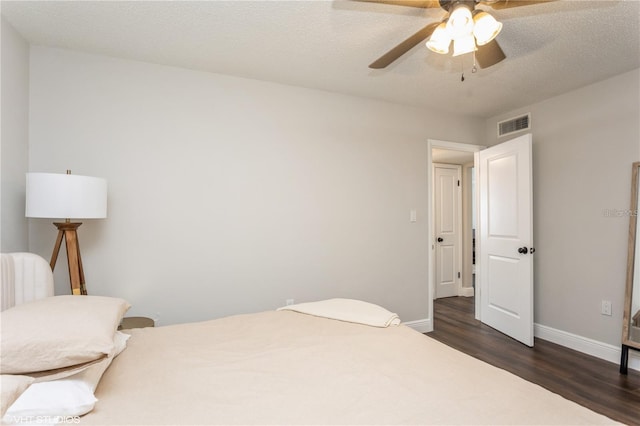 2207 S Carolina Ave Unit 10, Tampa, FL 33629 - bedroom with dark wood-type flooring and a ceiling fan