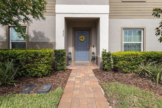255 Annabelle Way, Davenport, FL 33837 - property entrance featuring stucco siding