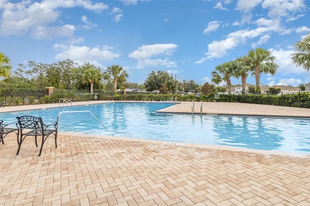255 Annabelle Way, Davenport, FL 33837 - community pool with a patio