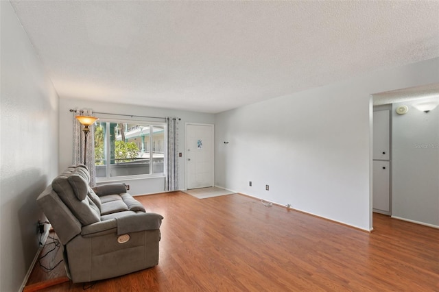 2370 Jamaican St Unit 44, Clearwater, FL 33763 - sitting room with wood finished floors and baseboards