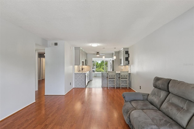 2370 Jamaican St Unit 44, Clearwater, FL 33763 - living room featuring wood finished floors