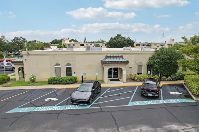 2370 Jamaican St Unit 44, Clearwater, FL 33763 - view of building exterior with uncovered parking