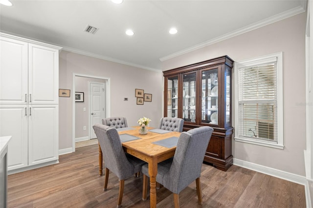 13252 SW 6th Ave, Newberry, FL 32669 - dining room featuring ornamental molding, light wood finished floors, and recessed lighting