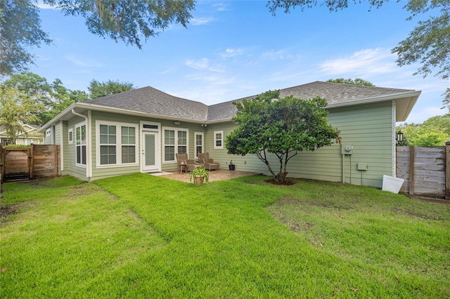 13252 SW 6th Ave, Newberry, FL 32669 - rear view of house featuring a patio, a fenced backyard, and roof with shingles