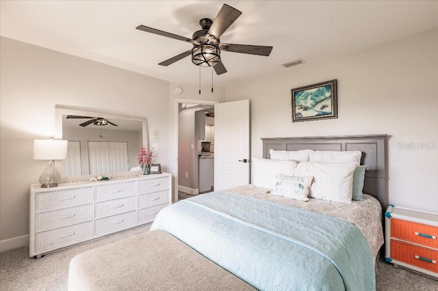 20 Bunker Ter, Rotonda West, FL 33947 - carpeted bedroom featuring baseboards and ceiling fan