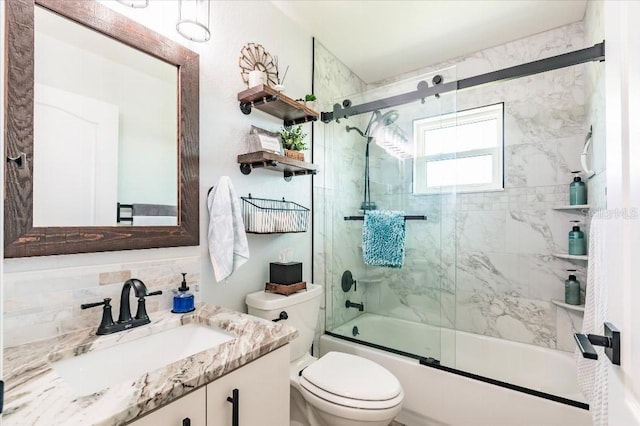 20 Bunker Ter, Rotonda West, FL 33947 - bathroom featuring vanity, enclosed tub / shower combo, and backsplash