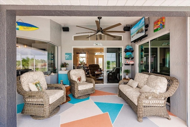 20 Bunker Ter, Rotonda West, FL 33947 - living room featuring ceiling fan and beam ceiling