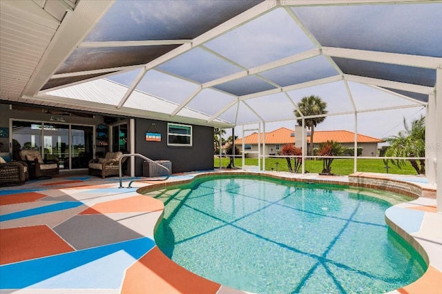 20 Bunker Ter, Rotonda West, FL 33947 - outdoor pool featuring a patio area, outdoor lounge area, glass enclosure, and a lawn