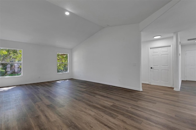 4957 N Cranberry Blvd, North Port, FL 34286 - empty room featuring dark wood finished floors, lofted ceiling, and recessed lighting