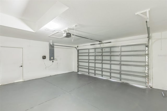 4957 N Cranberry Blvd, North Port, FL 34286 - garage featuring electric panel and a garage door opener
